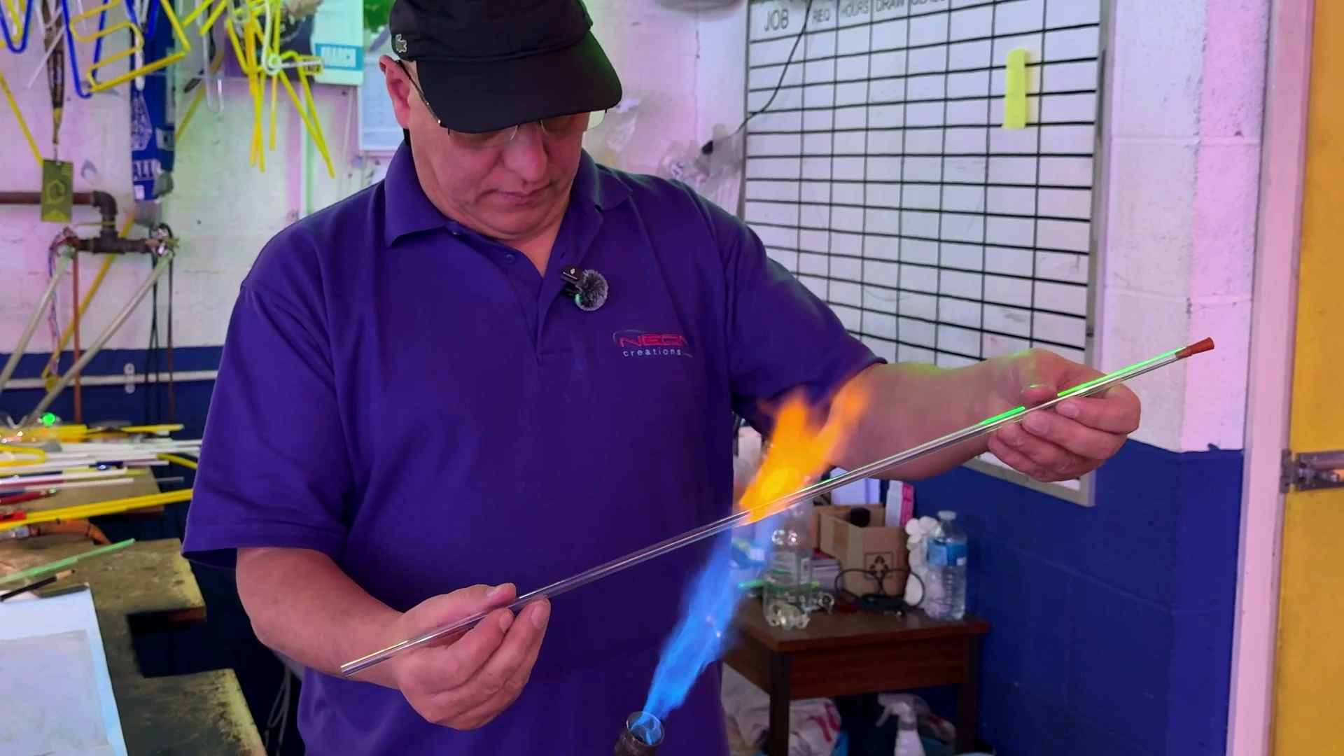 Glass bending over flame